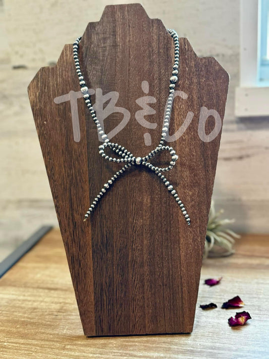 Graduated Sterling Silver Bow Necklace